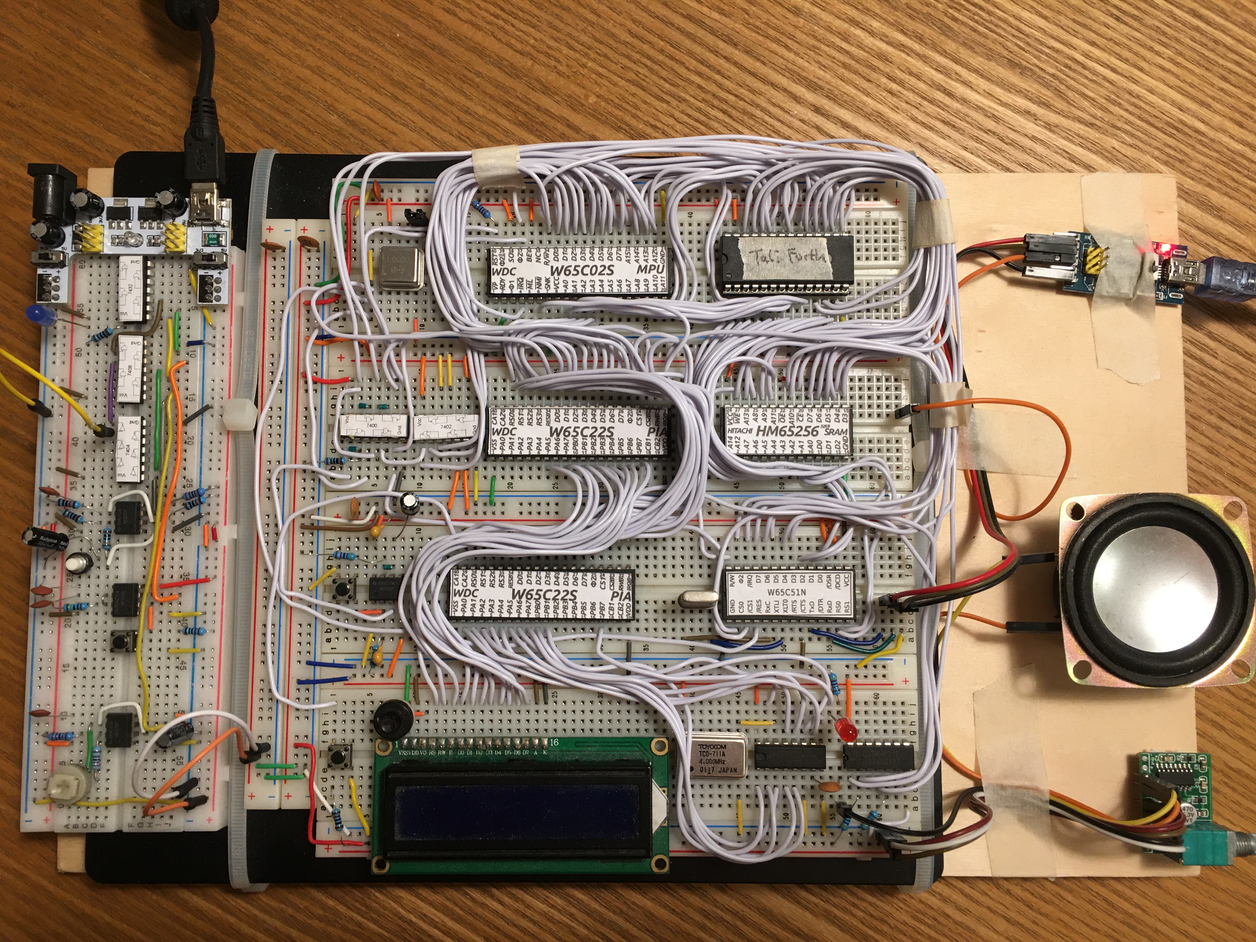 My BE6502 breadboard computer powered by KrisOS : r/beneater